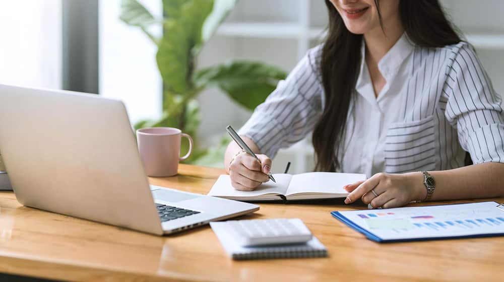 Woman Writing a Blog Post