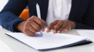 Freelance Writer Signing a Contract