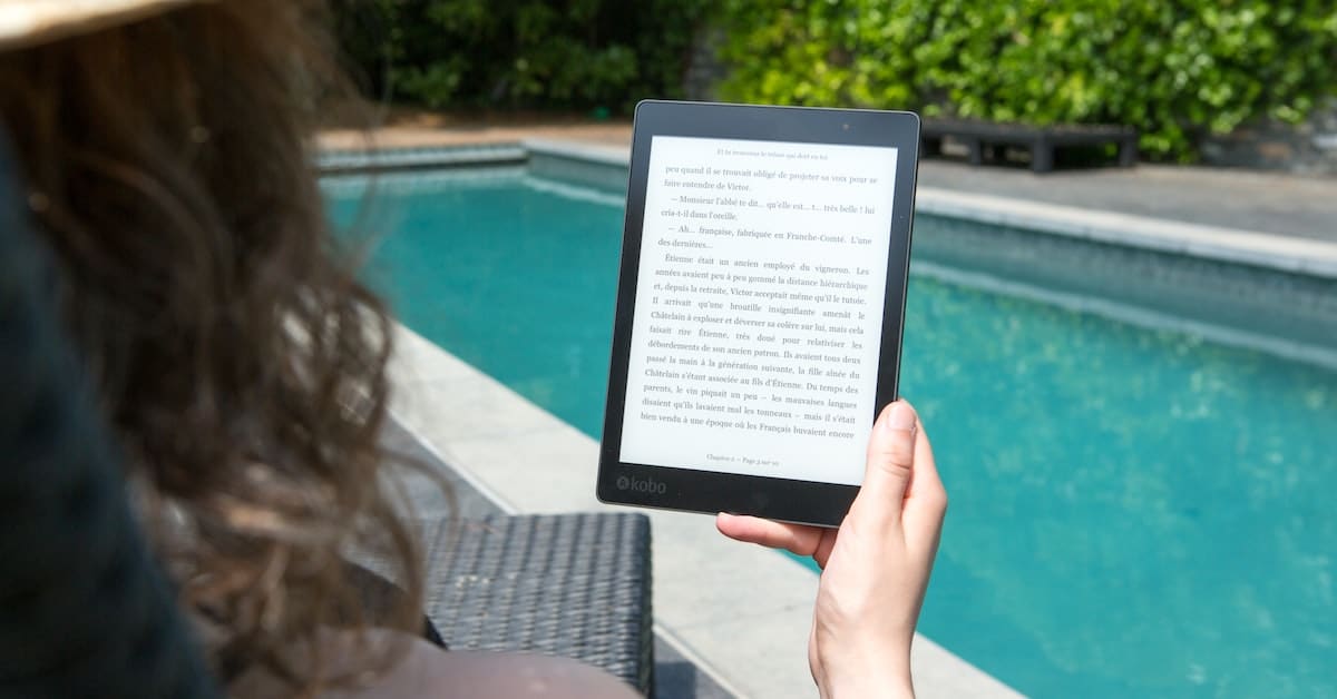 woman reading ebook she bought at fair price